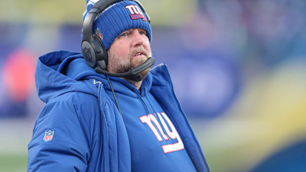 Brian Daboll looks on from the sidelines.